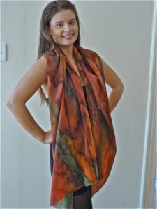 Womans Autumn wrap in fine Australian merino wool voile handpainted in unique colours