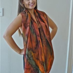 Womans Autumn wrap in fine Australian merino wool voile handpainted in unique colours